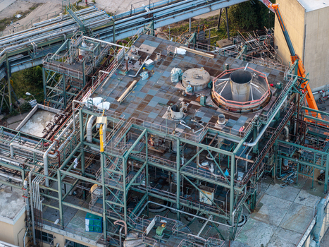 Aerial view of Heizkraftwerk Klingenberg combined heat and power plant featuring industrial piping metal structures and a large circular ventilation shaft in Berlin Berlin Germany. Aerial view of Heizkraftwerk Klingenberg combined heat and power plant featuring industrial piping metal structures and a large circular ventilation shaft in Berlin Berlin Germany.