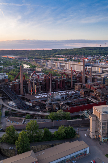 Volklingen Germany 09 May 2026 Aerial view of the Volklingen Ironworks with its massive blast furnaces and industrial structures under a sunset sky. Volklingen Germany 09 May 2026 Aerial view of the Volklingen Ironworks with its massive blast furnaces and industrial structures under a sunset sky.