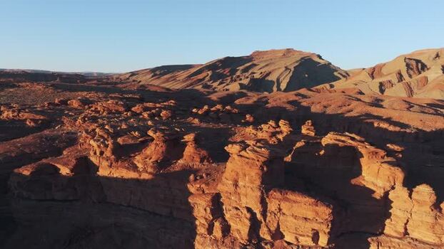 Aerial view of red rock formations and desert landscape in Moab United States.