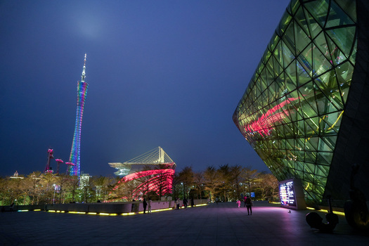 Guangzhou China 24 February 2024 View of the illuminated Canton Tower and modern glass architecture in the city center at night. Guangzhou China 24 February 2024 View of the illuminated Canton Tower and modern glass architecture in the city center at night.