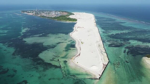 Aerial view of the tropical island and sand reclamation Maldives. Aerial view of the tropical island and sand reclamation Maldives.
