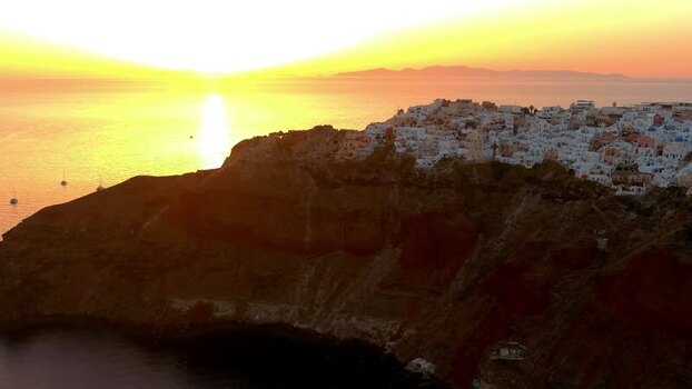 Aerial view of Oia village at sunset Greece. Aerial view of Oia village at sunset Greece.