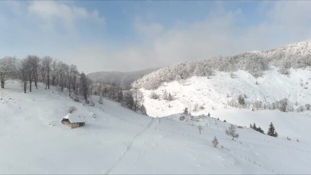 Aerial view of snowy mountains in Brasov Romania. Aerial view of snowy mountains in Brasov Romania.