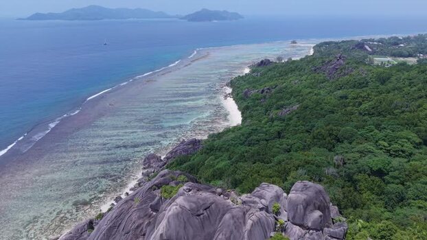 Aerial view of Anse Reunion beach and coastline Seychelles.