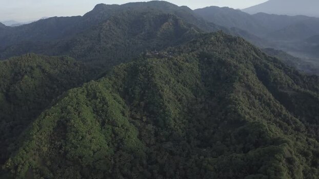 Aerial view of Mount Agung and lush tropical forest Indonesia. Aerial view of Mount Agung and lush tropical forest Indonesia.