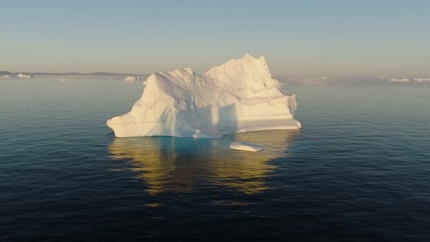 Aerial view of a large iceberg in arctic waters Greenland. Aerial view of a large iceberg in arctic waters Greenland.