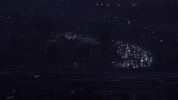 Aerial view of night highway traffic in Algeria.