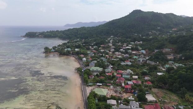 Aerial view of Mahe coastline and houses Seychelles.