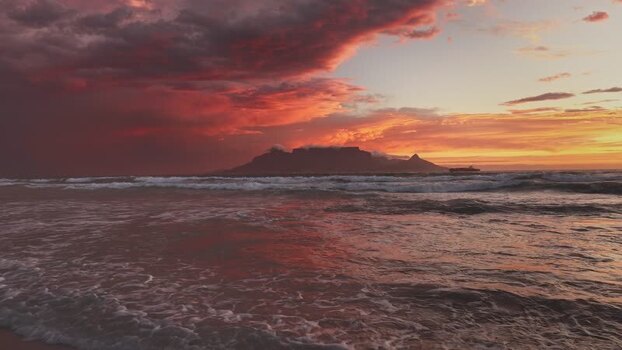 View of Table Mountain and ocean at sunset South Africa.