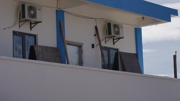 View of building exterior in San Jose Northern Mariana Islands. View of building exterior in San Jose Northern Mariana Islands.