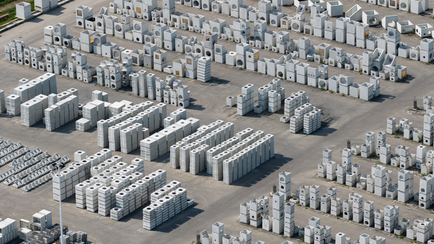 Aerial view of rows of stacked precast concrete elements and industrial building materials in a large storage yard Oosterhout North Brabant Netherlands. Aerial view of rows of stacked precast concrete elements and industrial building materials in a large storage yard Oosterhout North Brabant Netherlands.