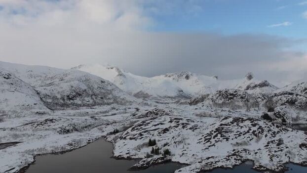 Aerial view of Lofoten mountains in winter Norway.