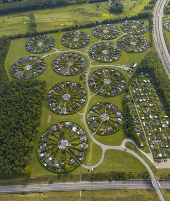 Aerial view of Haveforeningen Harekaer circular garden allotments with unique radial patterns and lush green hedges in Brondby Denmark. Aerial view of Haveforeningen Harekaer circular garden allotments with unique radial patterns and lush green hedges in Brondby Denmark.