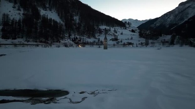Aerial view of the submerged church tower in Graun im Vinschgau Italy. Aerial view of the submerged church tower in Graun im Vinschgau Italy.