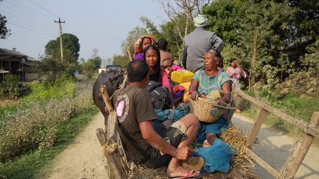 View of people on a traditional wooden cart in Dhangadhi Nepal.