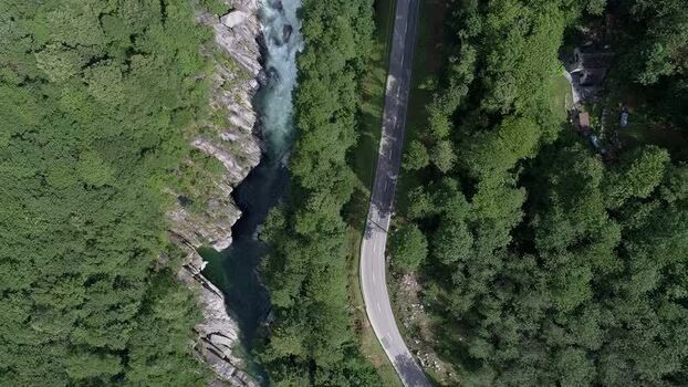 Aerial view of the winding road and Verzasca River Switzerland Aerial view of the winding road and Verzasca River Switzerland