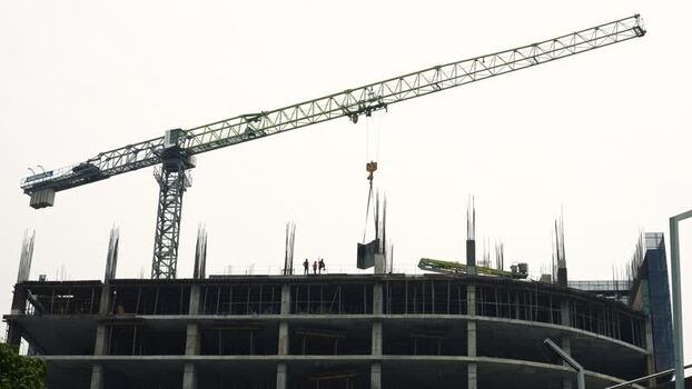 View of a construction crane on a building in Dhaka Bangladesh.
