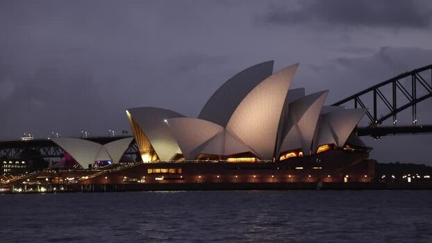 View of the illuminated Sydney Opera House at night Australia.