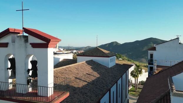 Aerial view of church bell tower and rooftops in Olvera Spain. Aerial view of church bell tower and rooftops in Olvera Spain.