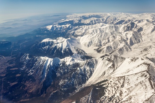 Aerial view of the snow capped peaks of the Taurus Mountains in Cukurova Turkey.