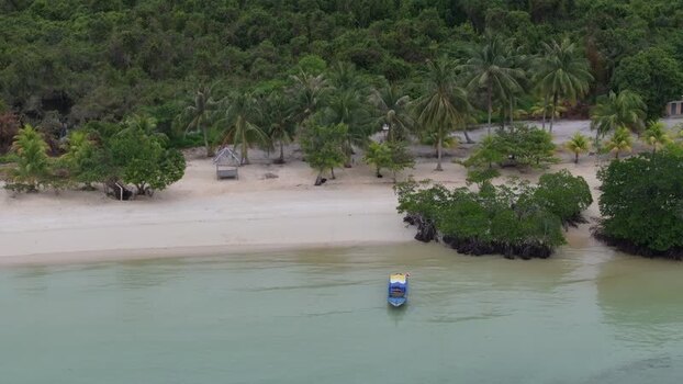 Aerial view of a boat on the beach in Batam Indonesia. Aerial view of a boat on the beach in Batam Indonesia.