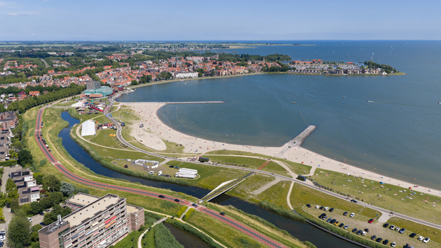 Hoorn Netherlands 20 June 2026 Aerial view of Stadsstrand Hoorn a sandy beach along the Markermeer featuring a curved shoreline grassy dunes and the historic city center in the background. Hoorn Netherlands 20 June 2026 Aerial view of Stadsstrand Hoorn a sandy beach along the Markermeer featuring a curved shoreline grassy dunes and the historic city center in the background.