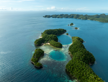 Aerial view of Bucas Grande featuring lush green islands turquoise lagoons and clear shallow waters in Siargao Philippines. Aerial view of Bucas Grande featuring lush green islands turquoise lagoons and clear shallow waters in Siargao Philippines.