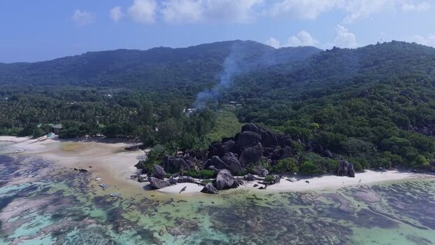 Aerial view of Anse Reunion beach and granite boulders Seychelles.
