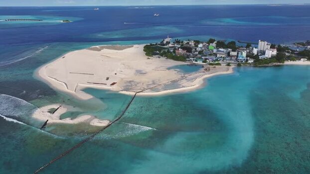 Aerial view of Gulhi island and turquoise waters Maldives. Aerial view of Gulhi island and turquoise waters Maldives.