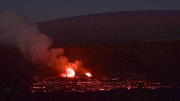 View of a volcanic eruption at night United States.