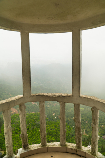 View of the misty green hills and lush forest from the balcony of Ambuluwawa Tower in Gampola Central Province Sri Lanka. View of the misty green hills and lush forest from the balcony of Ambuluwawa Tower in Gampola Central Province Sri Lanka.