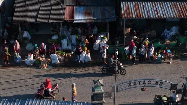 Aerial view of a busy street market in Kemalang Indonesia.