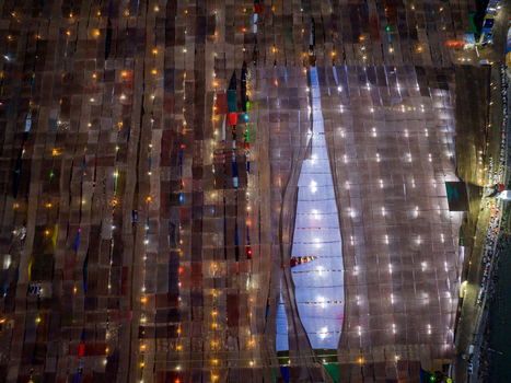 Aerial view of a vibrant tapestry of illuminated structures and pathways Charmonai Barisal Division Bangladesh. Aerial view of a vibrant tapestry of illuminated structures and pathways Charmonai Barisal Division Bangladesh.