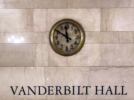 New York City USA 16 May 2026 View of the iconic analog clock mounted on the marble wall above the Vanderbilt Hall inscription in Grand Central Terminal. New York City USA 16 May 2026 View of the iconic analog clock mounted on the marble wall above the Vanderbilt Hall inscription in Grand Central Terminal.