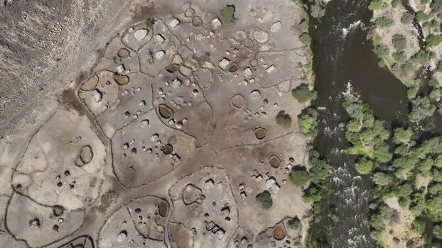 Aerial view of a traditional village by a river Ethiopia. Aerial view of a traditional village by a river Ethiopia.