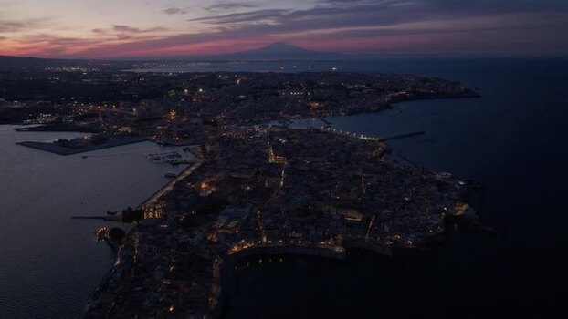 Aerial view of Island of Ortigia at twilight in Syracuse Italy. Aerial view of Island of Ortigia at twilight in Syracuse Italy.