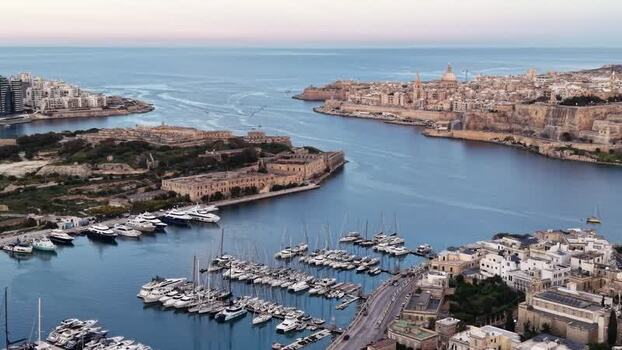 Aerial view of yachts in the harbor and historic forts Malta. Aerial view of yachts in the harbor and historic forts Malta.