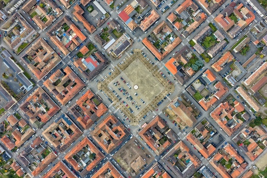 Aerial view of the meticulously planned symmetrical grid of streets and buildings converging on the central square a captivating display of urban design Neuf Brisach Grand Est France.