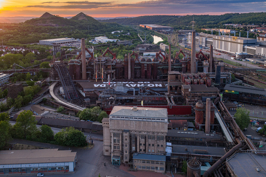 Volklingen Germany 09 May 2026 Aerial view of the Volklingen Ironworks industrial complex with blast furnaces and chimneys under a sunset sky. Volklingen Germany 09 May 2026 Aerial view of the Volklingen Ironworks industrial complex with blast furnaces and chimneys under a sunset sky.
