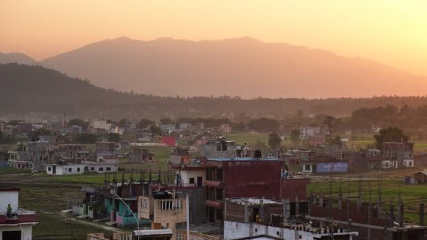 View of a town and mountains at sunset Nepal.