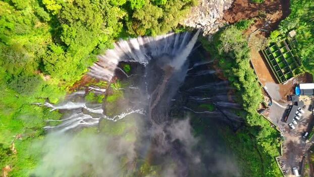 Aerial view of Tumpak Sewu Waterfall in Indonesia.