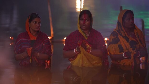 View of women performing a religious ritual in Bogura Bangladesh. View of women performing a religious ritual in Bogura Bangladesh.