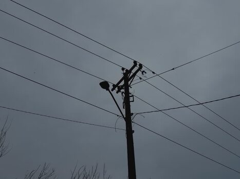 View of a utility pole against a stormy sky Northern Mariana Islands. View of a utility pole against a stormy sky Northern Mariana Islands.