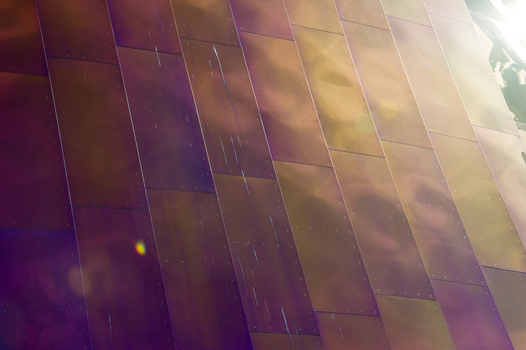 View of the iridescent metallic panels on the exterior of the Museum of Pop Culture in Seattle Washington United States.