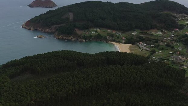 Aerial view of Xilloi Beach and lush green hills Spain. Aerial view of Xilloi Beach and lush green hills Spain.