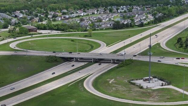 Aerial view of a highway interchange with traffic United States. Aerial view of a highway interchange with traffic United States.