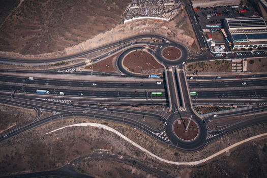 Aerial view of a complex highway interchange with multiple roundabouts and bridges in Bocacangrejo Canarias Spain. Aerial view of a complex highway interchange with multiple roundabouts and bridges in Bocacangrejo Canarias Spain.