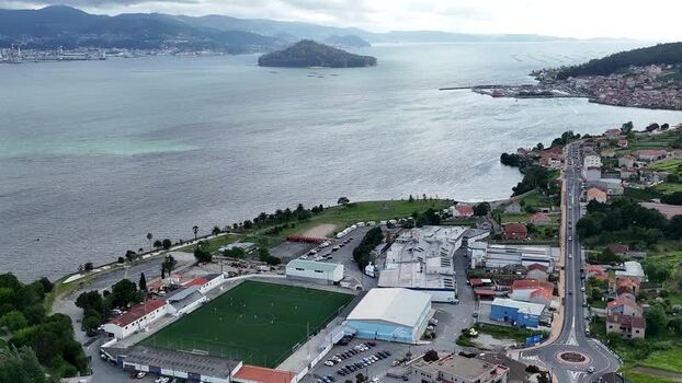 Aerial view of Campo de futbol A Reiboa and the coast Spain.
