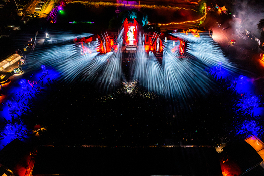 Herzogenaurach Germany 27 July 2025 Aerial view of the Open Beatz Festival featuring a massive main stage with vibrant light shows lasers and a large crowd at night. Herzogenaurach Germany 27 July 2025 Aerial view of the Open Beatz Festival featuring a massive main stage with vibrant light shows lasers and a large crowd at night.
