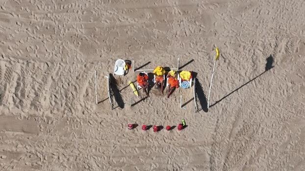 Aerial view of lifeguards on Tamariz Beach Portugal.
